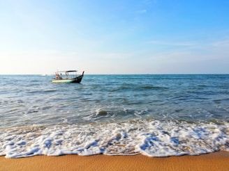 boat on body of water during daytime