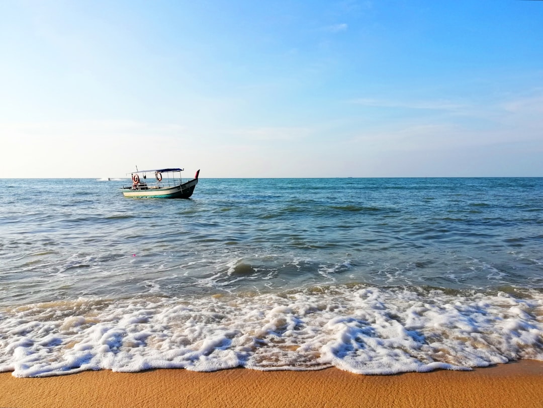 boat on body of water during daytime