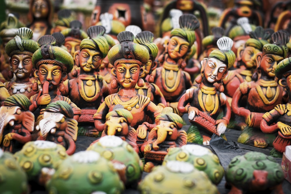 selective focus photography of statues
