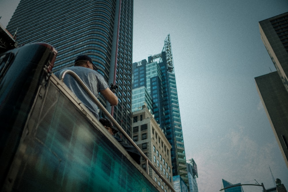 person on the edge of building