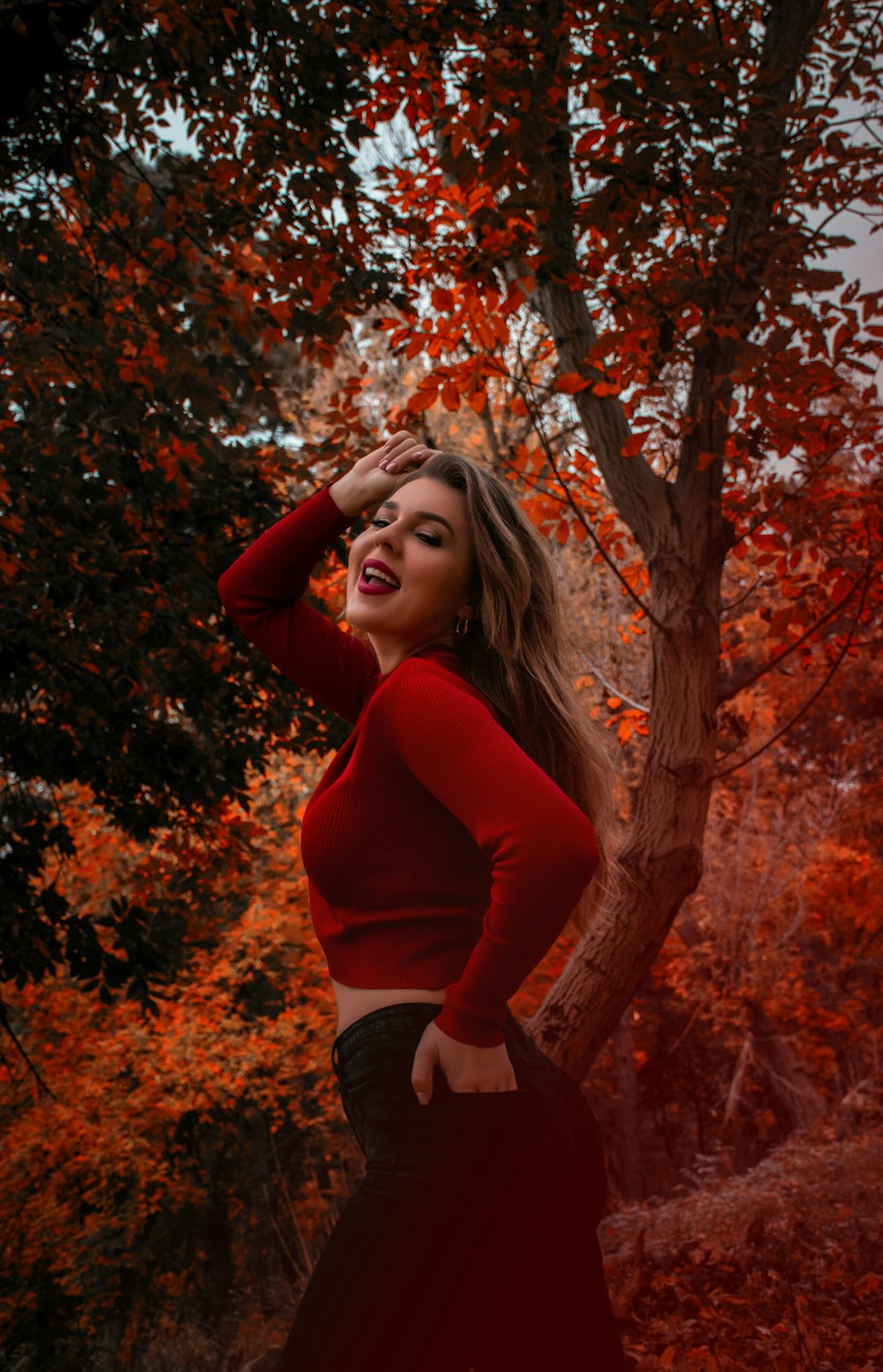 woman standing near tree