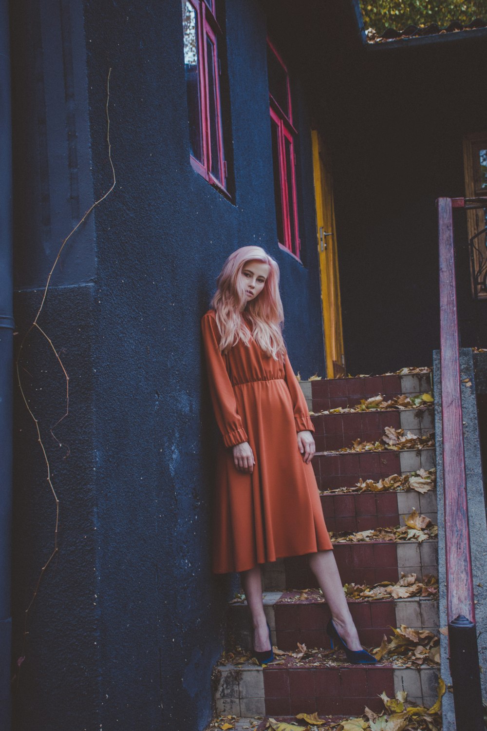 woman standing on staircase