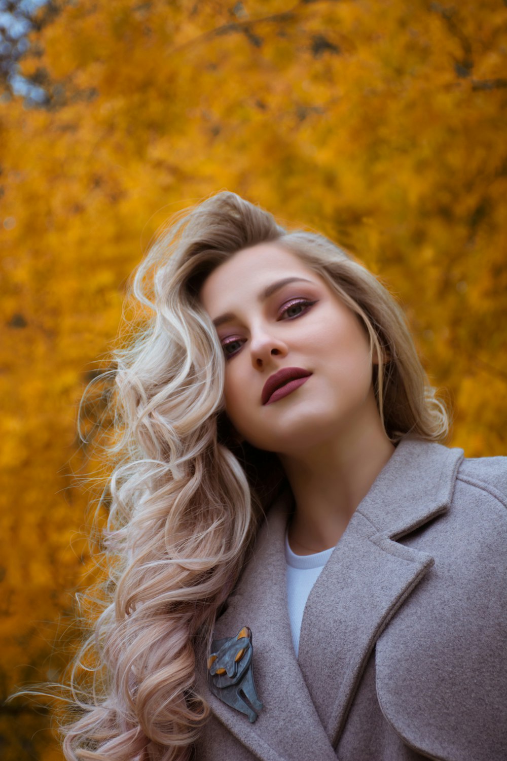 woman wearing gray coat