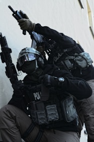 two policemen taking positions