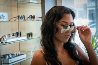 woman wearing sunglasses.