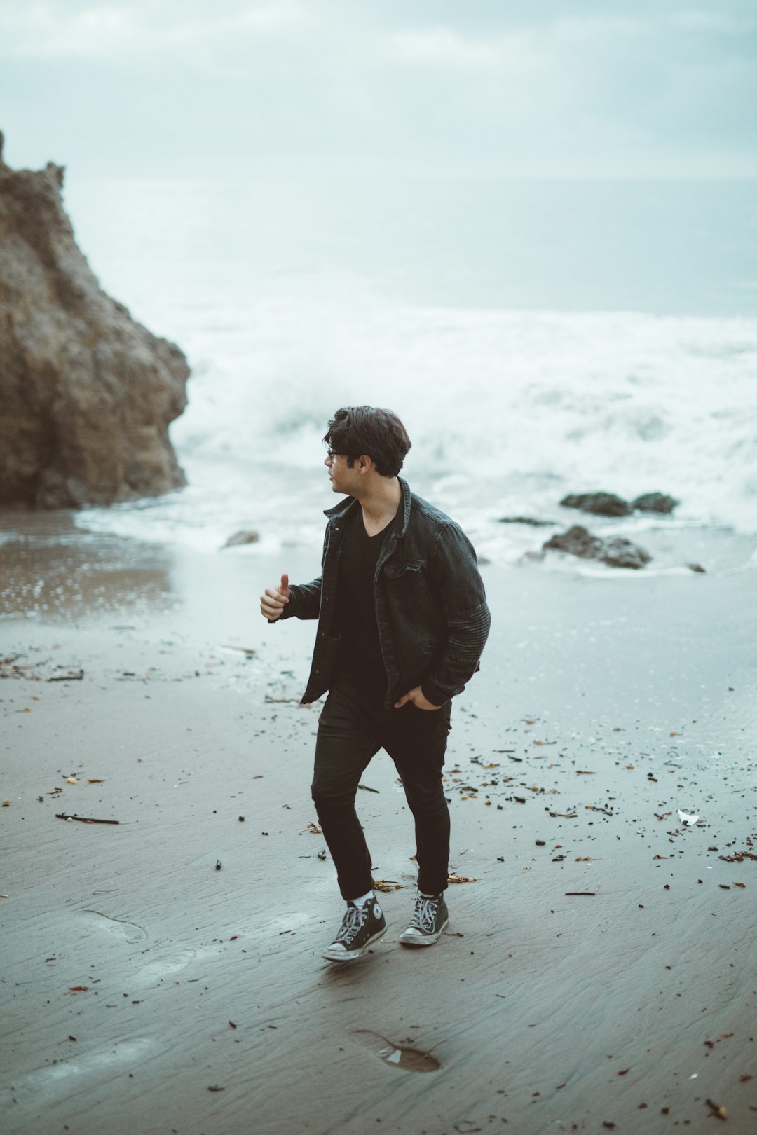 man walking near shore