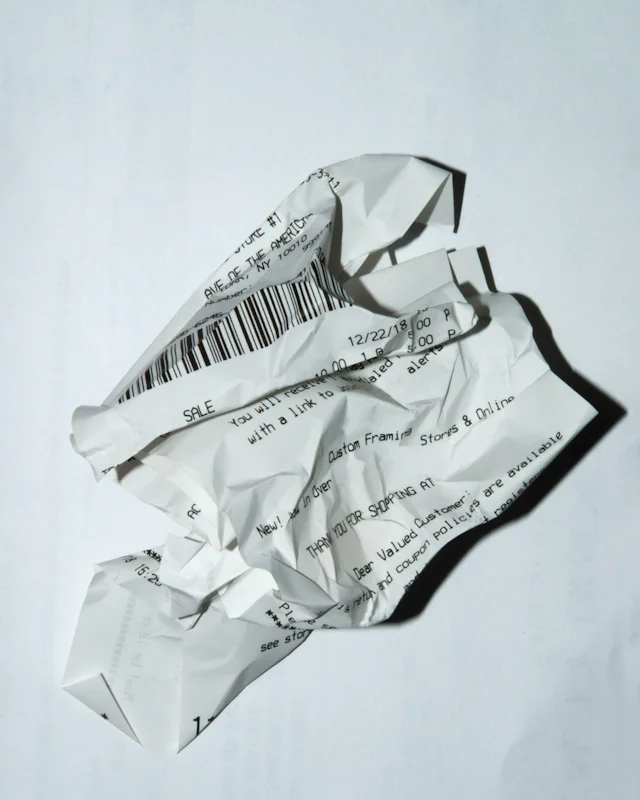 KRA eTIMS Compliance: What Every Business Owner Must Know — Printed receipt and digital invoicing records