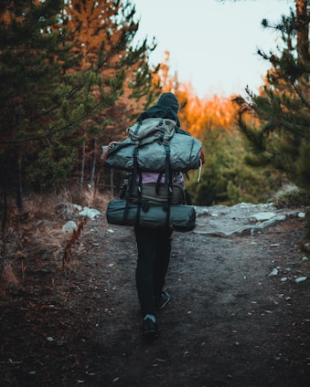 woman wearing hiking bags
