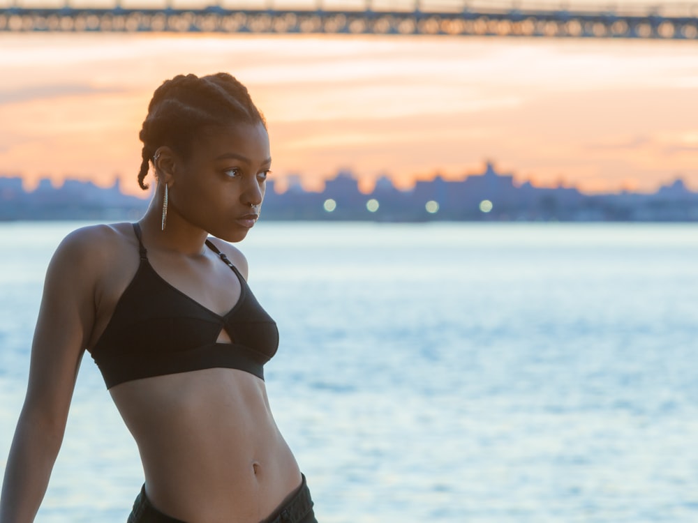 shallow focus photo of woman in black bikini top