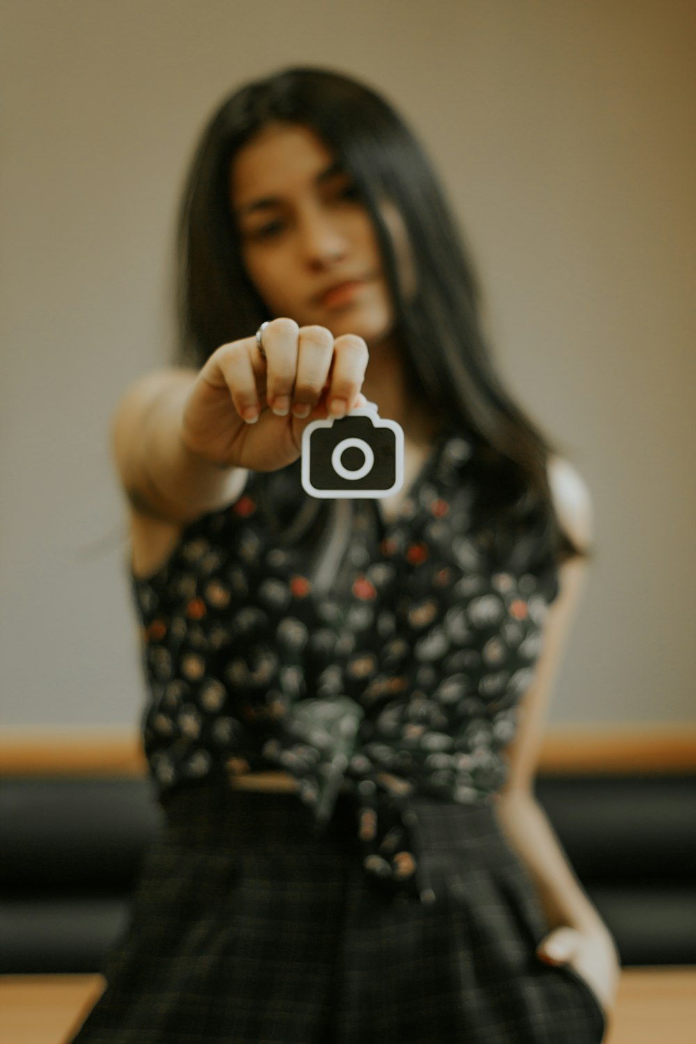 woman holding camera sticker