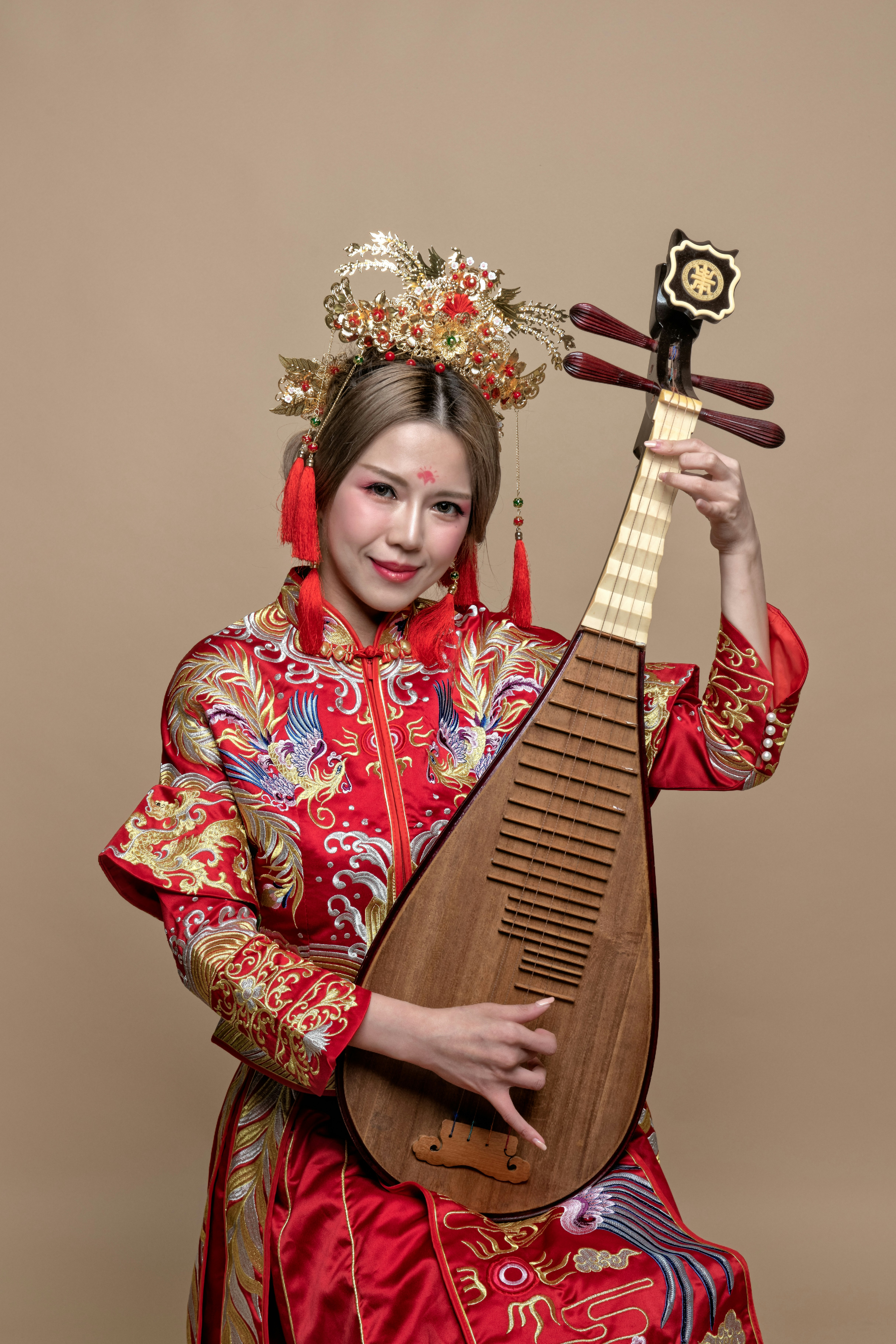 Woman holding string instrument while smiling photo – Free Brown Image ...