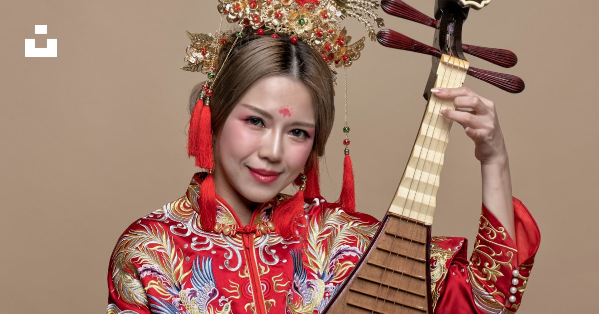 Woman holding string instrument while smiling photo – Free Brown Image ...