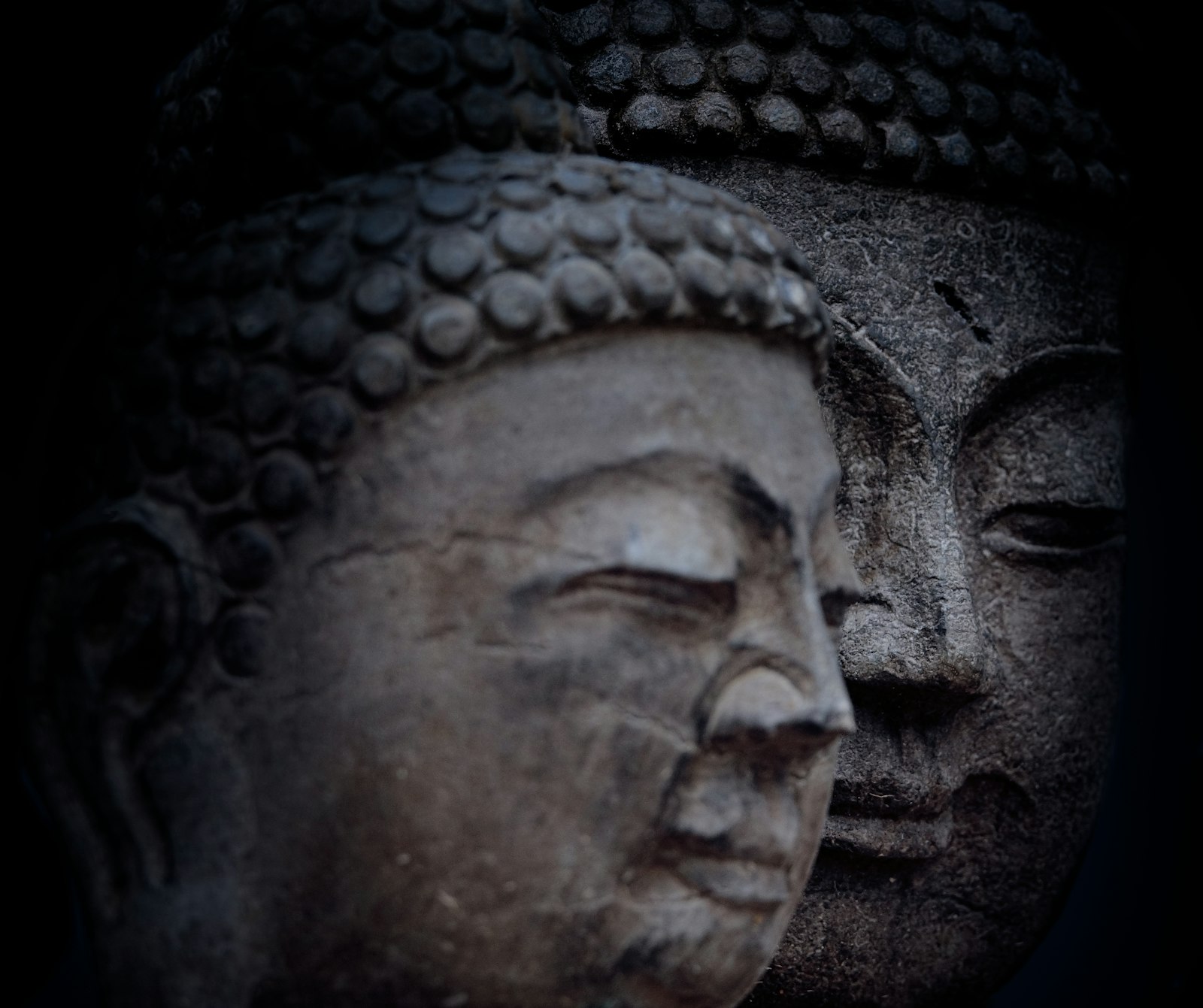 Sony 24-600mm F2.4-4.0 sample photo. Gray concrete buddha figurine photography