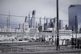 Philippines urban skyline with energy infrastructure in focus.