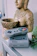 Close-up of a classic Super Nintendo console with original controllers on a wooden table.