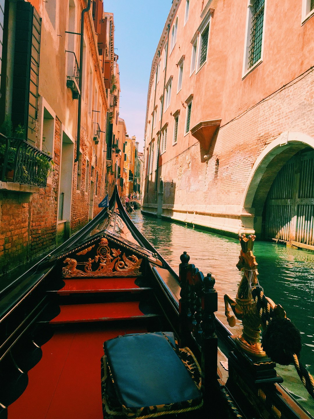 person riding boat during daytime