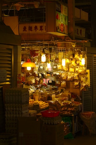 A lively market stall selling products with minimal packaging.