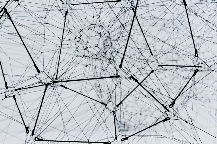 A network of connected lines and points on a white background