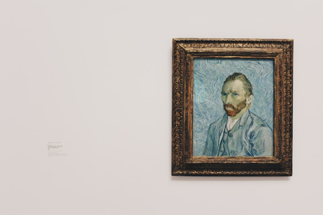 Vincent Van Gogh self portrait painting on wall,