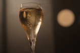 Natural-looking results of breast augmentation with soft champagne background