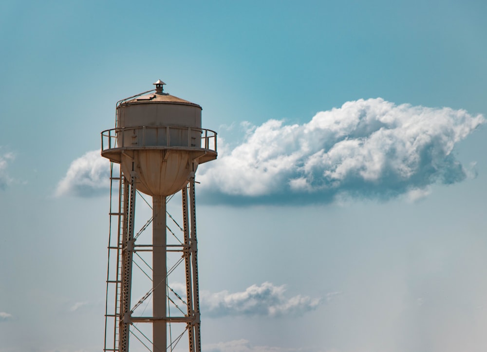 gray tower tank during daytime