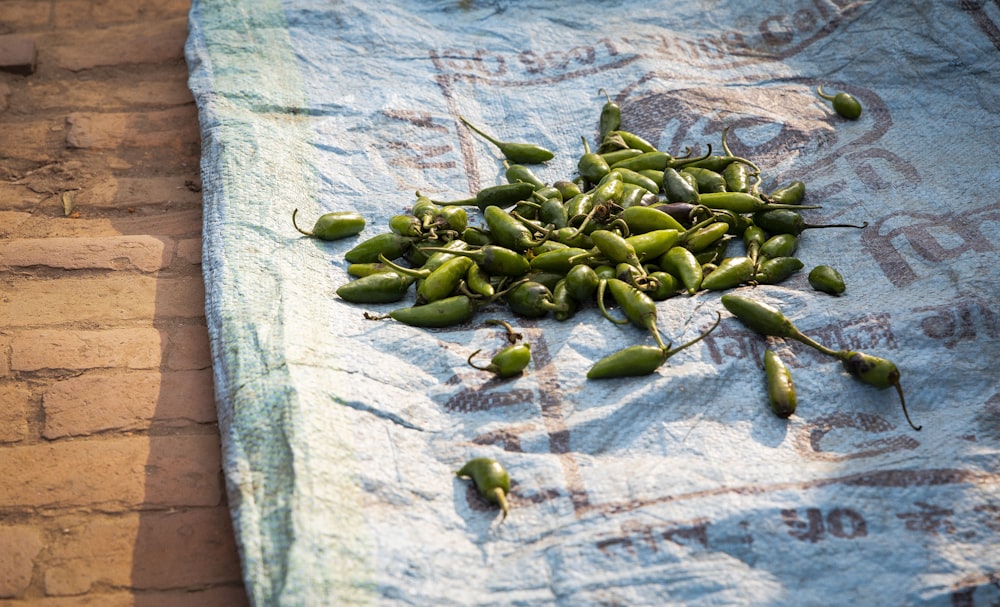 pile of green chili on sack