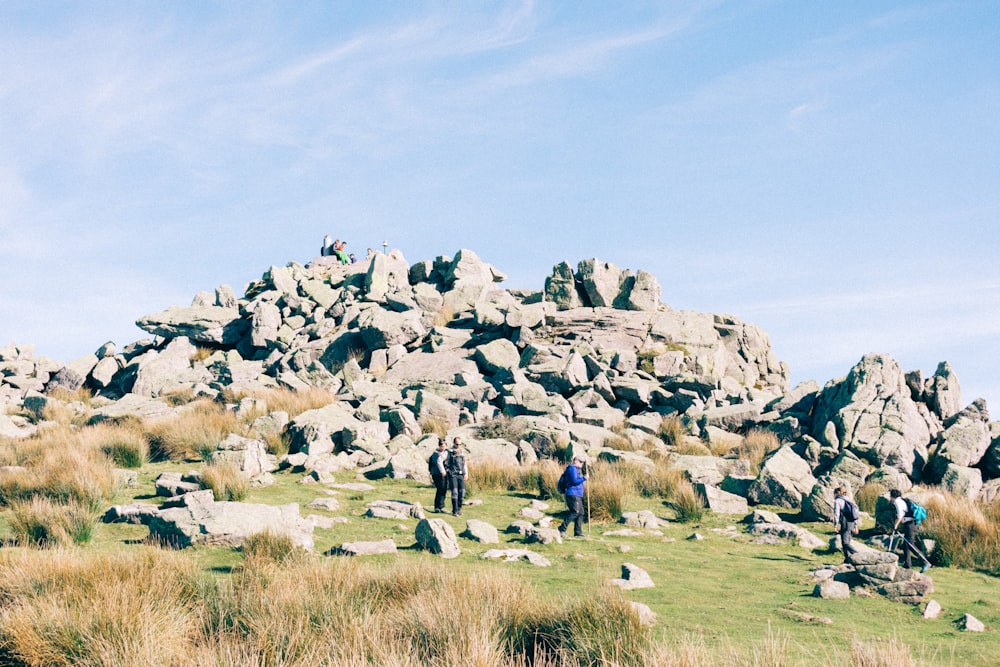 group of people on hill