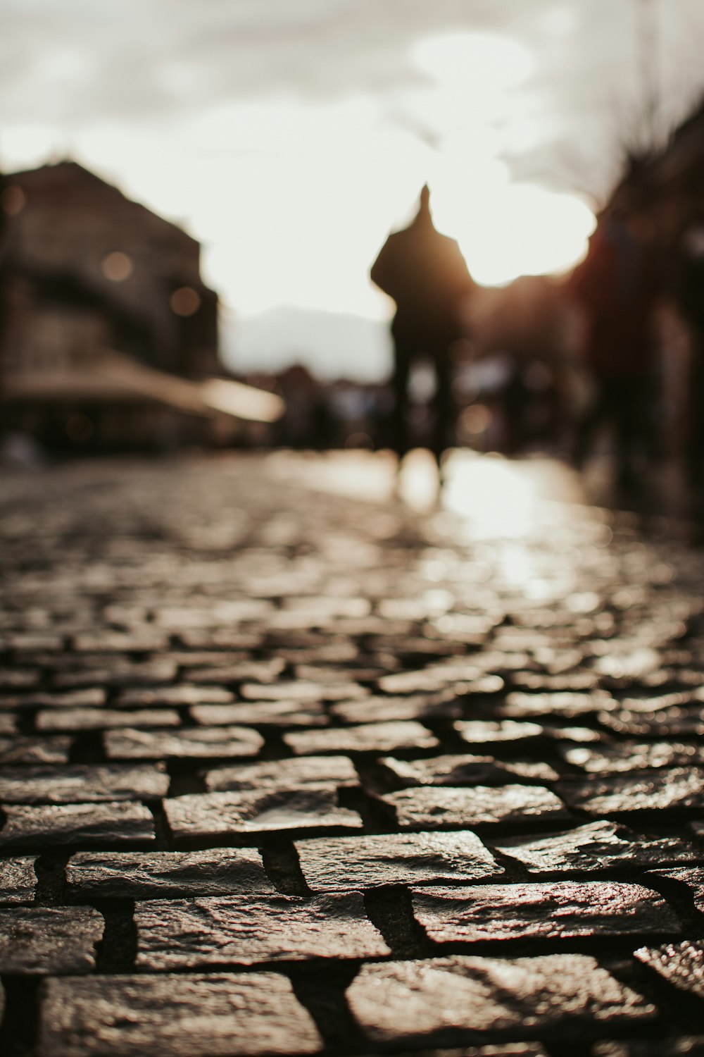 blurred photography of man standing on floor