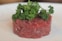 row meat on plate