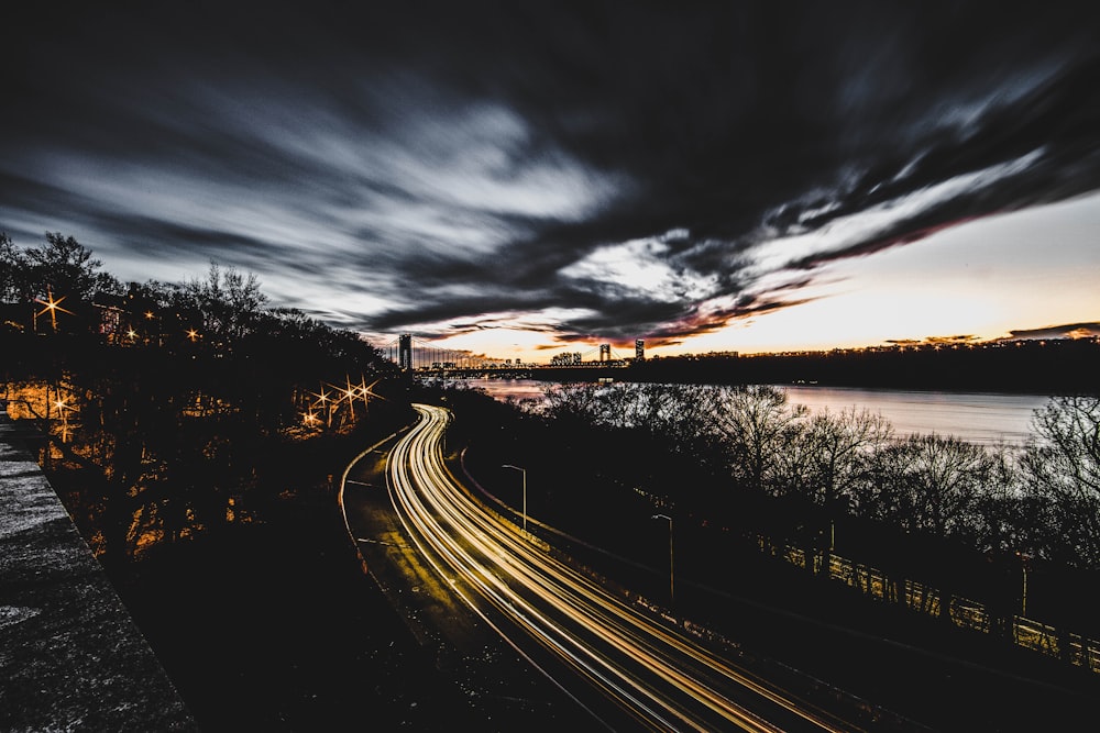 timelapse photography of road at night