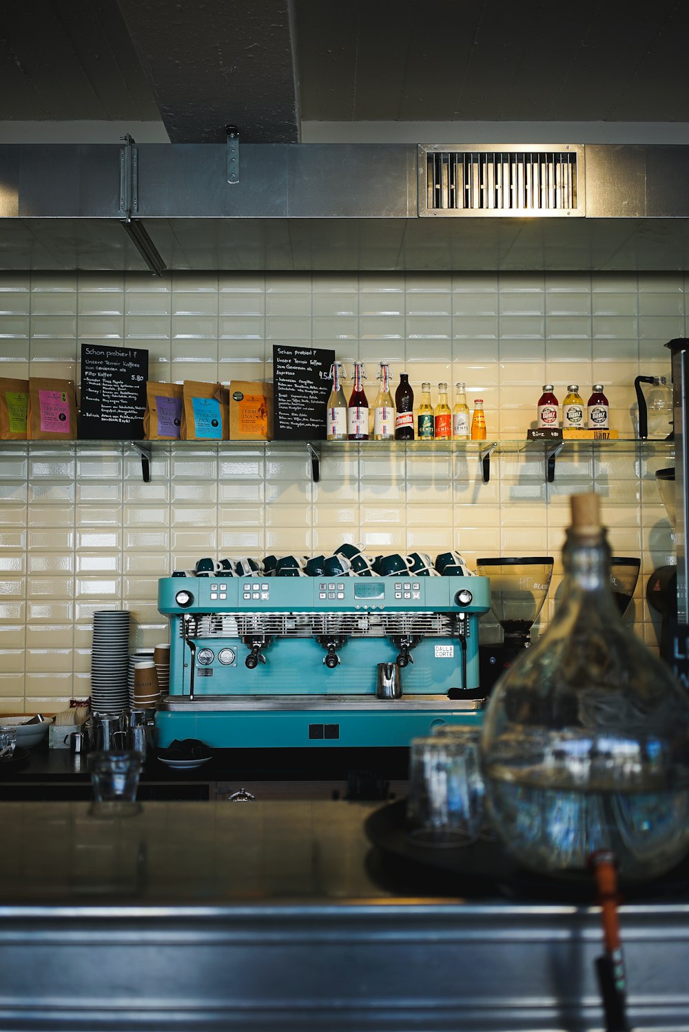 blue and black espresso machine