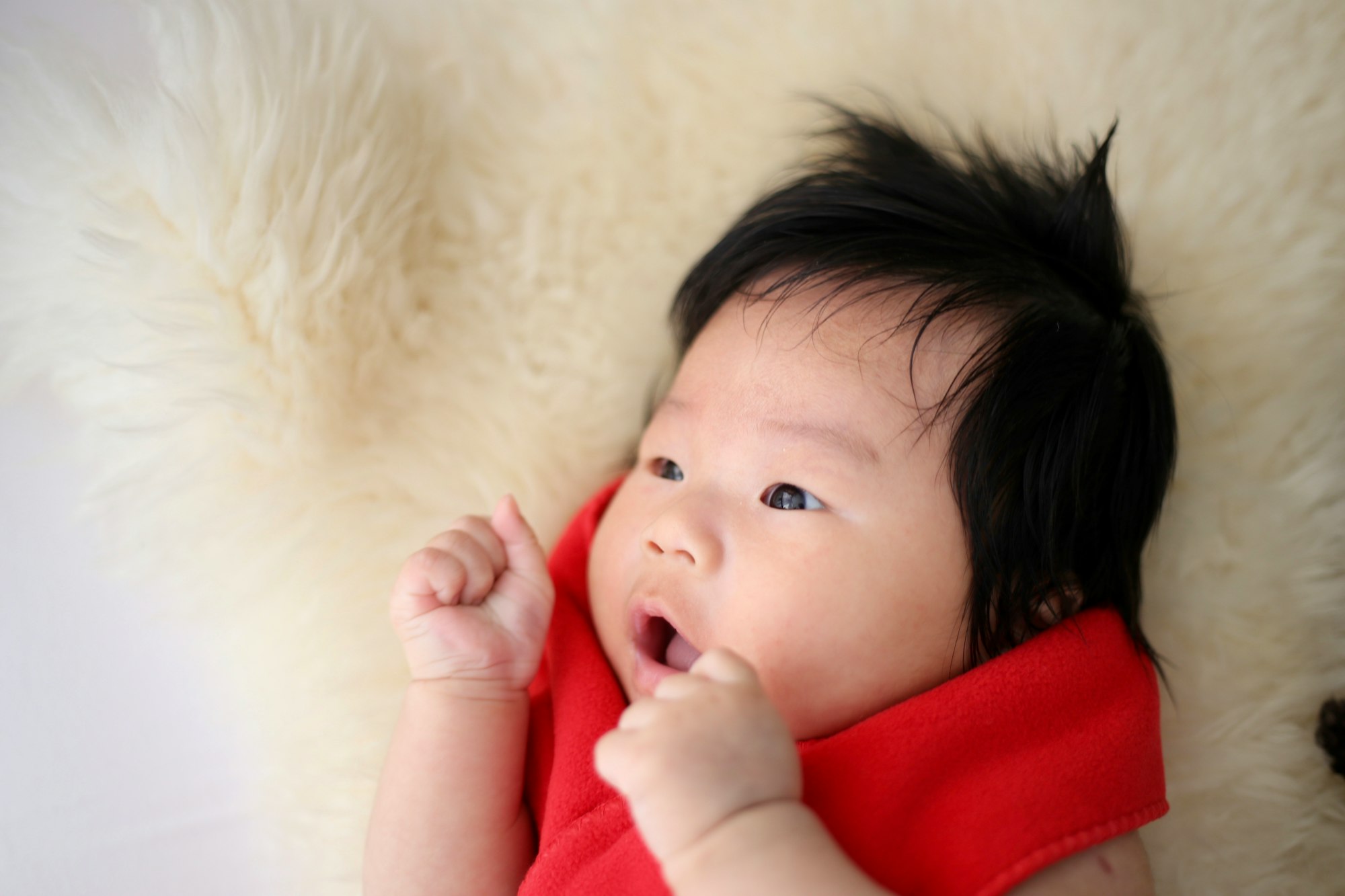 cute baby, baby in red, baby making fist, asian baby