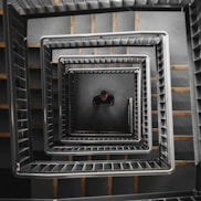 man standing center of the stair