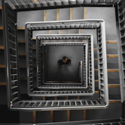 man standing center of the stair