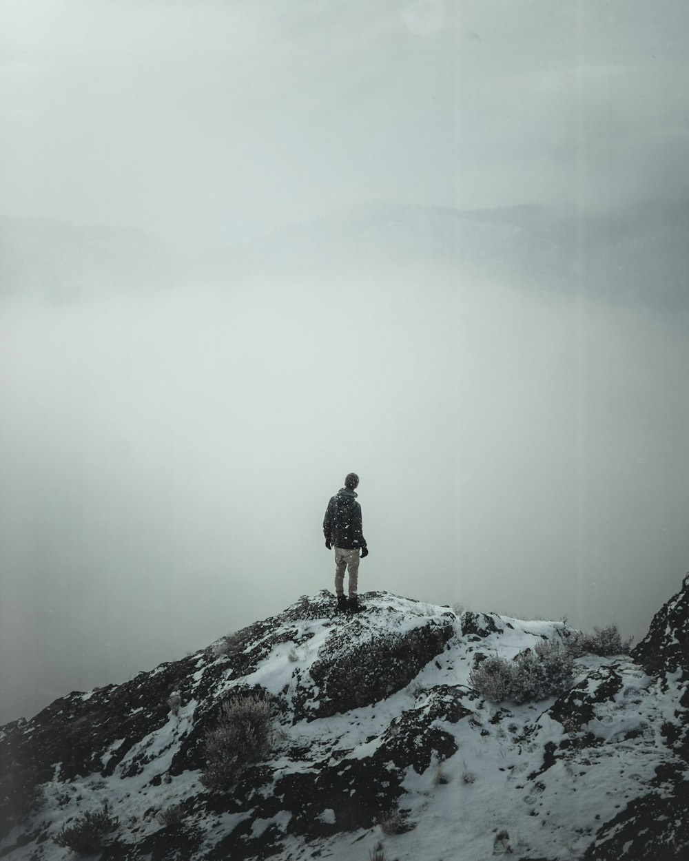 person standing on cliff