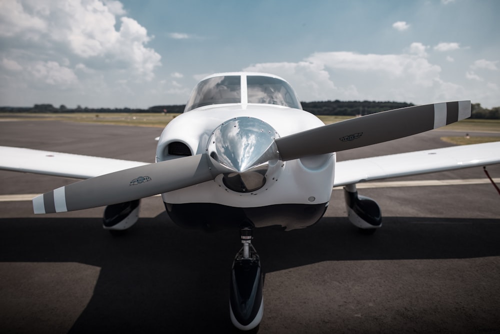 white monoplane on road