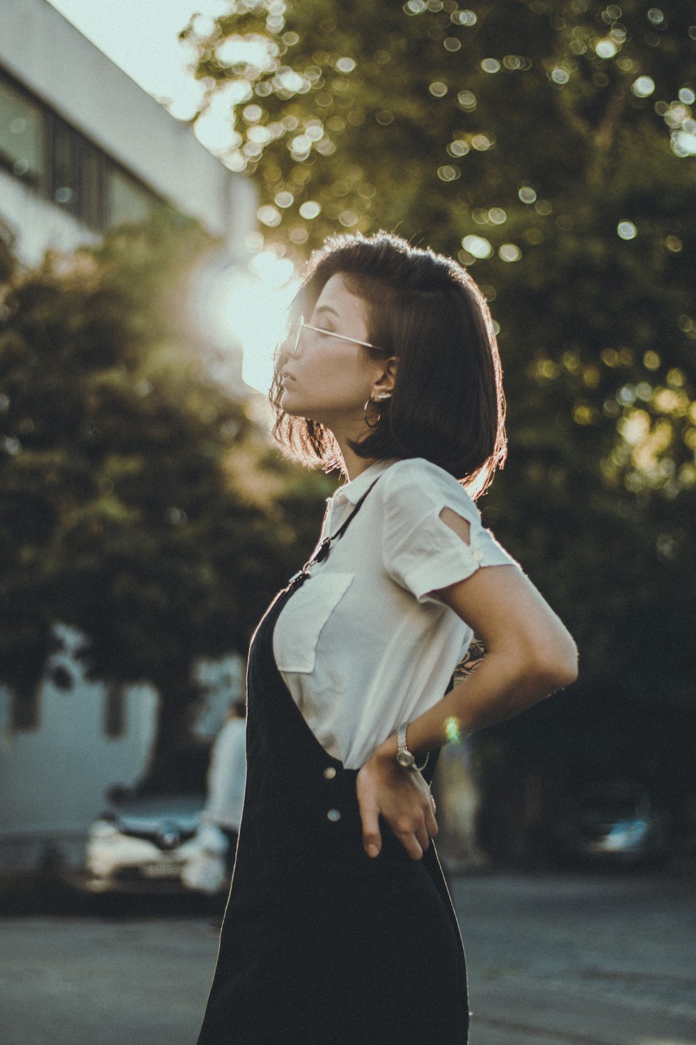 woman wearing black overalls suit