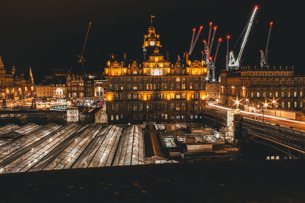 city with fireworks display during nighttime