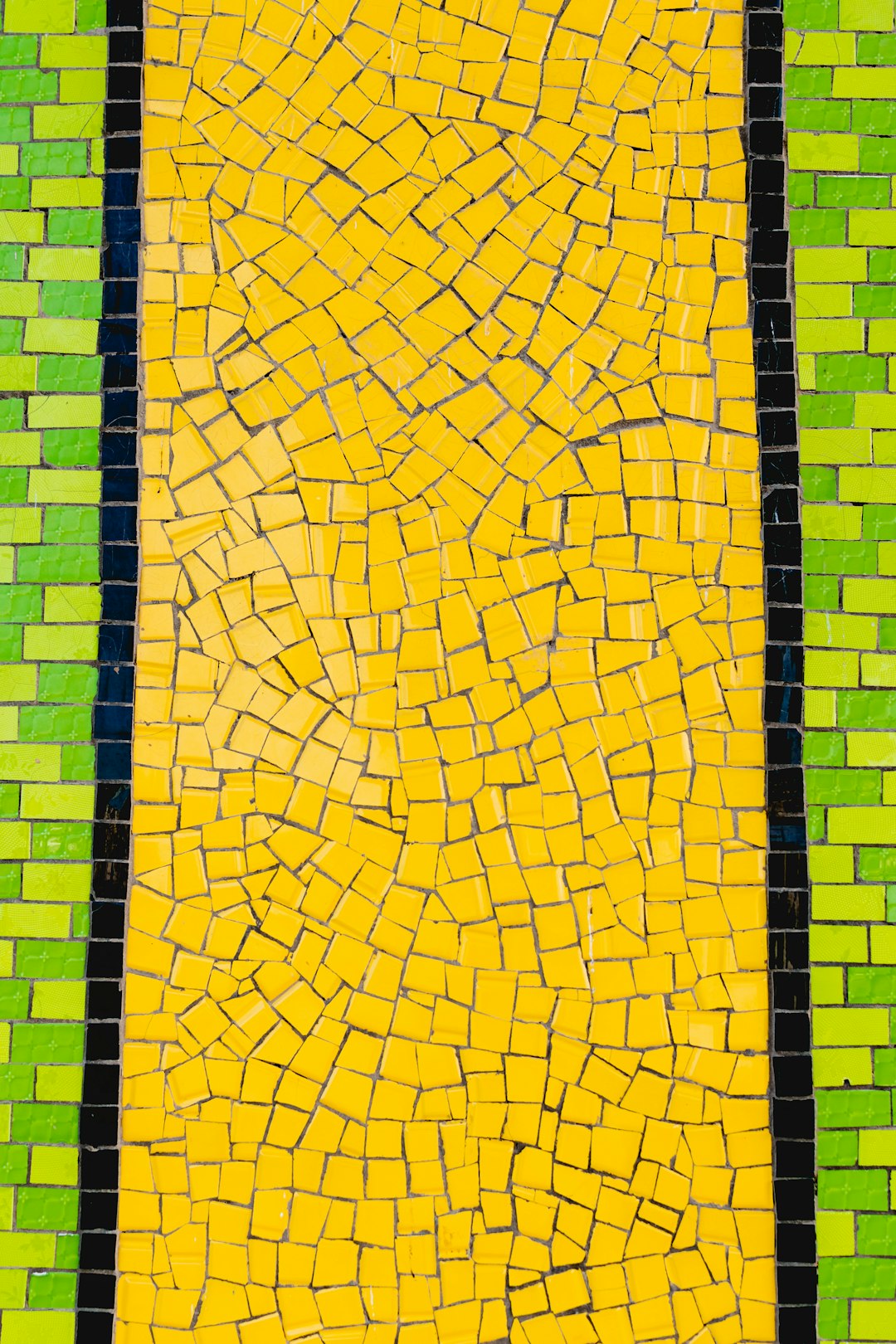 yellow, black, and green brick wall planning