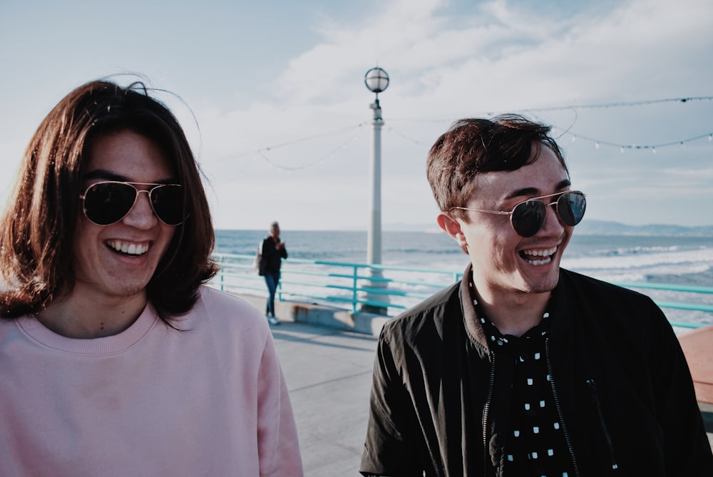 two men wearing sunglasses