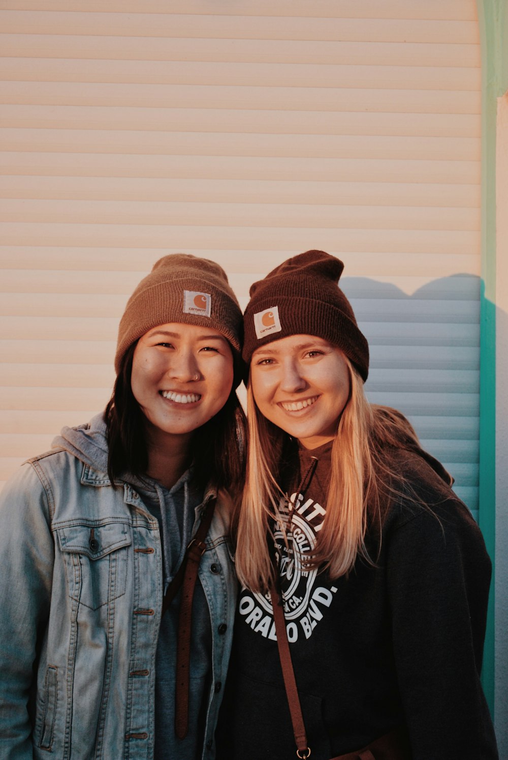 two smiling woman taking selfie