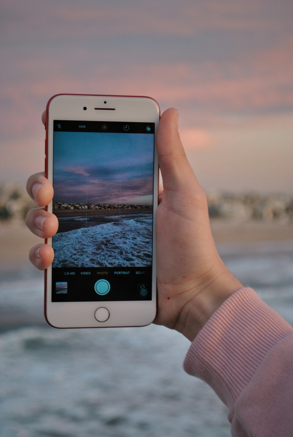 silver iPhone 6 and red case