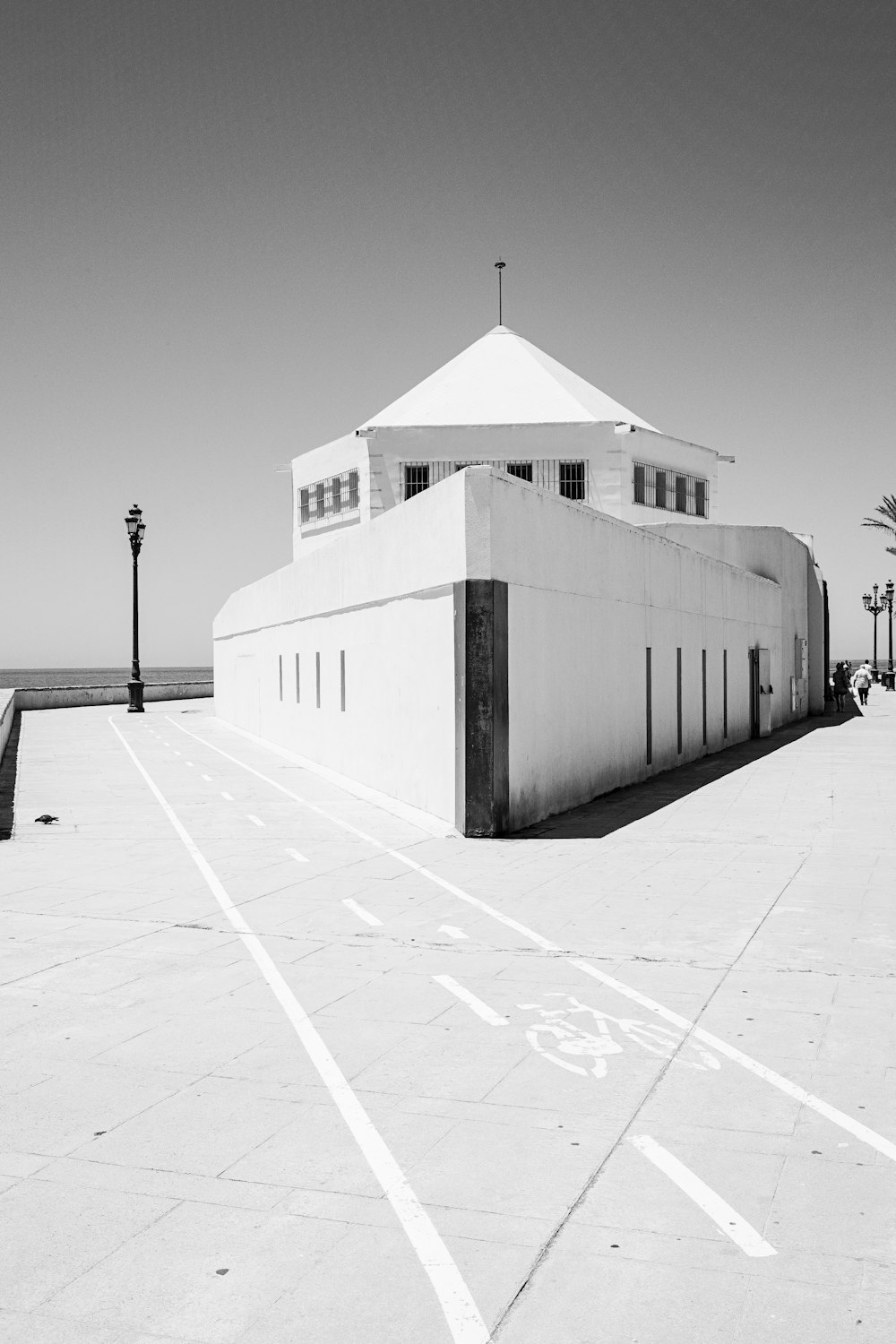 white concrete house near lamp post