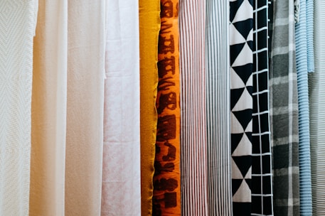 A variety of furniture fabrics displayed together.