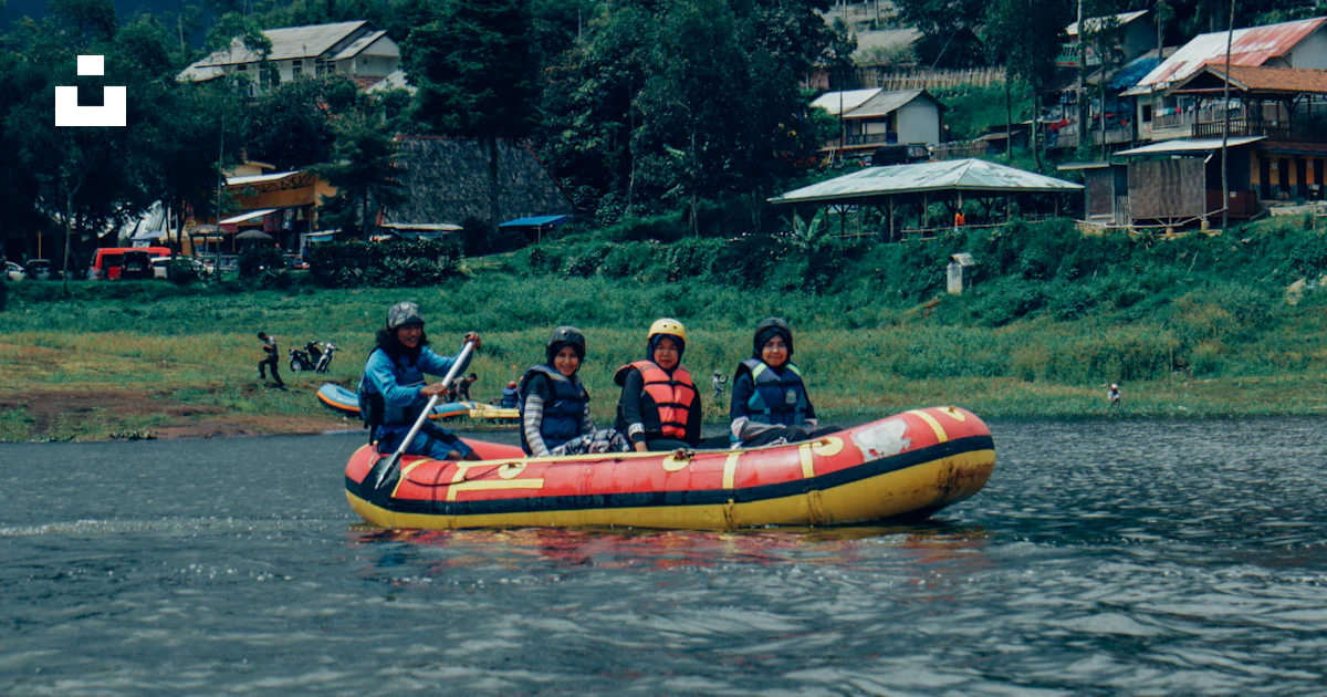 Guy On Inflatable Raft Four people riding on inflatable raft boat photo – Free Forest Image on ...