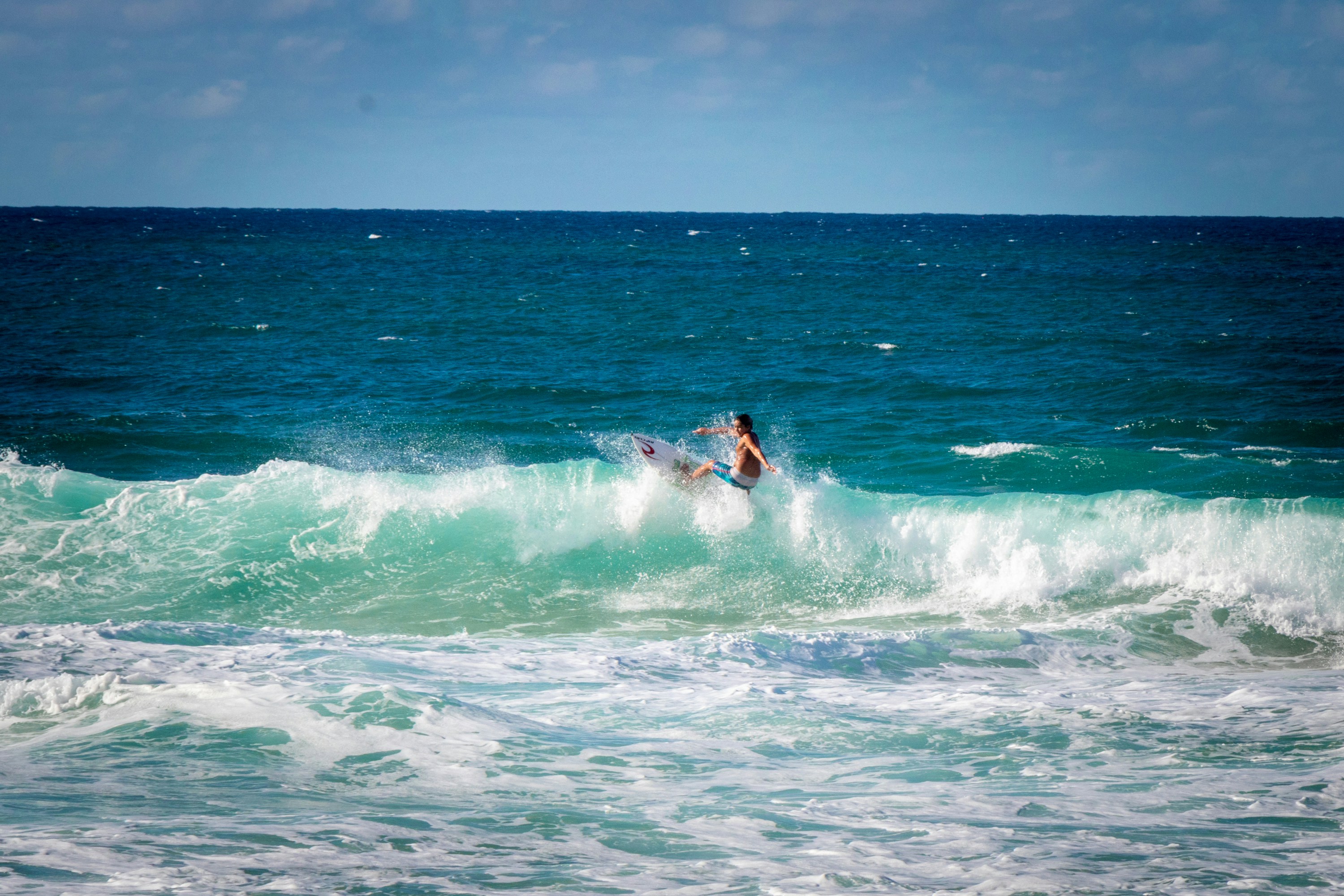 Surfer on Paradise Beach