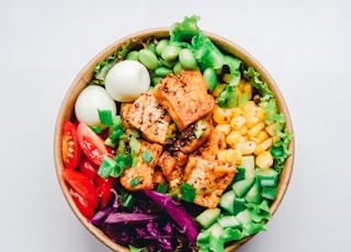 vegetable and meat on bowl