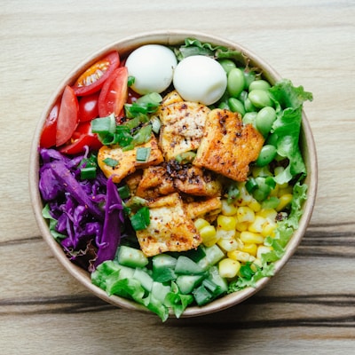 A colorful salad bowl with various vegetables.
