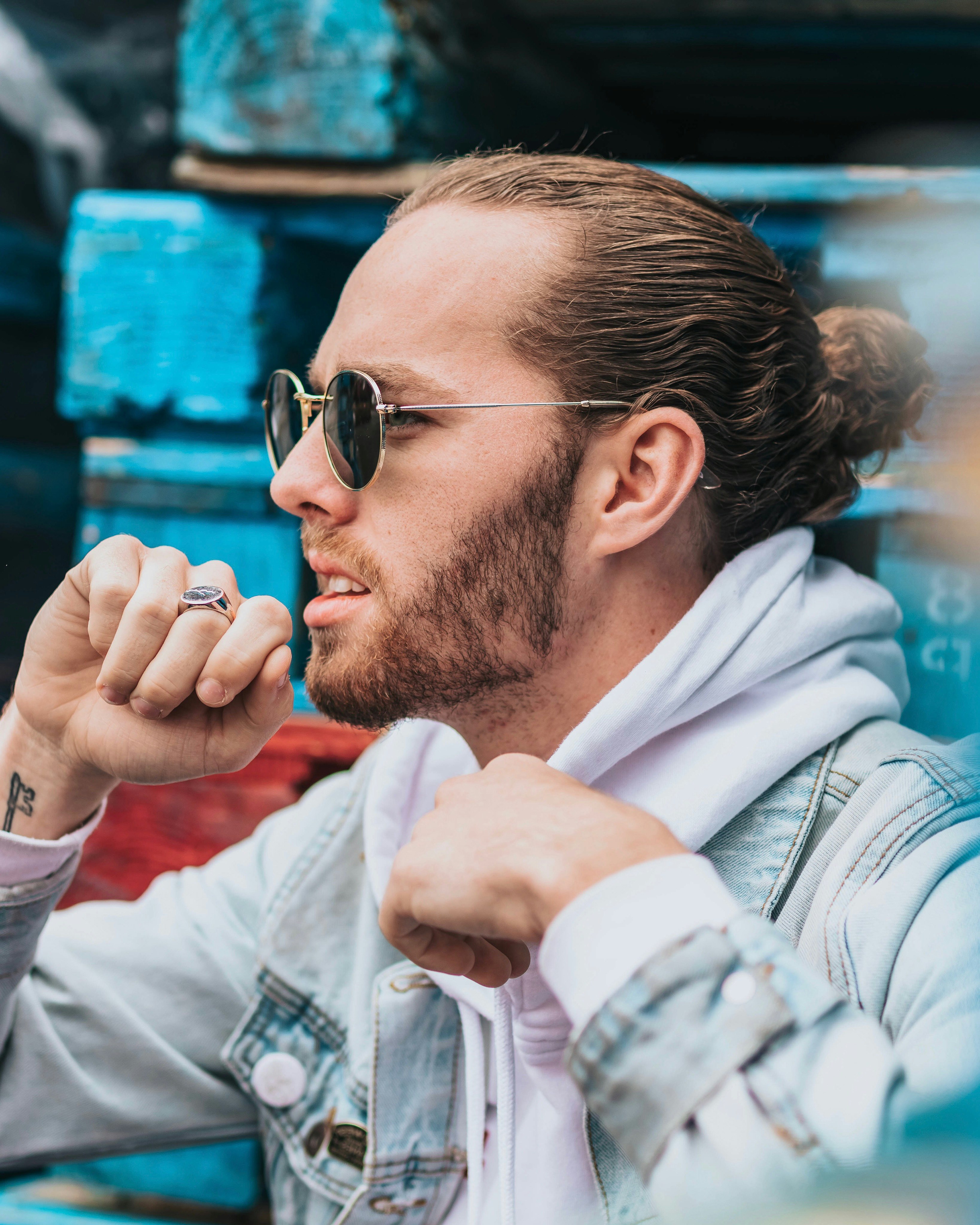 man wearing jacket and sunglasses