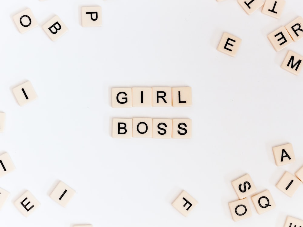 girl boss text on brown background